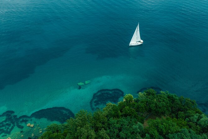 Full Day Cruise on Sailing Yacht in Corfu Island - Strogylo Beach gives you the longest swim