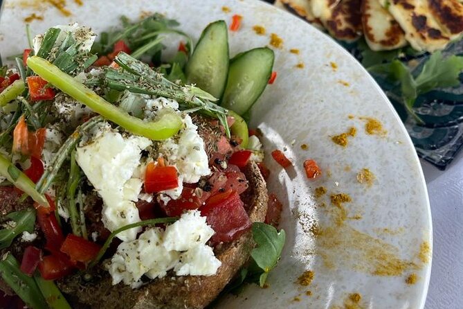Greek Gastronomy & Wine Pairing Cruise with a Sommelier in Athens - The onboard Greek feast, from seafood to moussaka