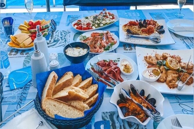 Half-Day Exclusive Catamaran Cruise in Santorini with Meal and Open Bar - Is the sunset sailing worth choosing?