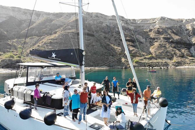 Half-Day Exclusive Catamaran Cruise in Santorini with Meal and Open Bar - What the $133 price includes