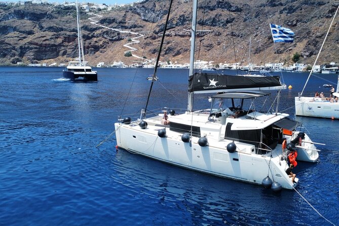 Half Day Premium Catamaran Cruise in Santorini including Oia - The volcano hot springs and warm water
