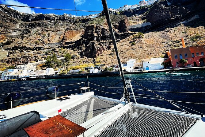 Half Day Premium Catamaran Cruise in Santorini including Oia - Thirassia: the best mix of swimming and dinner