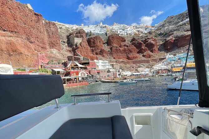 Half Day Premium Catamaran Cruise in Santorini including Oia - Seeing Oia from the water