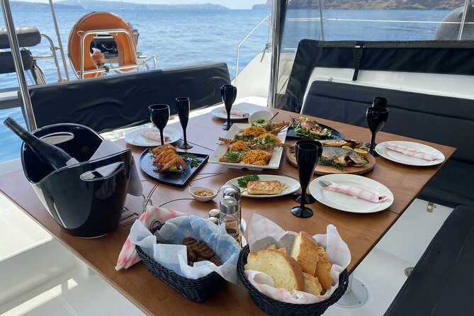 Half Day Premium Catamaran Cruise in Santorini including Oia - The Venetian lighthouse and the sunset sail