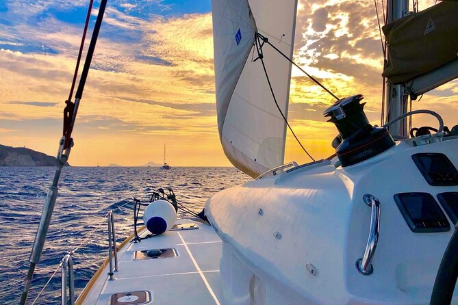 Half Day Premium Catamaran Cruise in Santorini including Oia - Food, drinks, towels, and crew service
