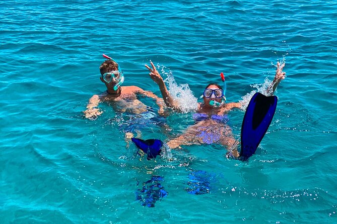 Heraklion: Catamaran Cruise to Dia with Sunset, Meal & Bar - Crew Service and the Feel Onboard
