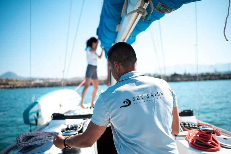 Heraklion: Dia Island Sunset Boat Tour with Dinner - Dinner with Greek salad and shrimp pasta