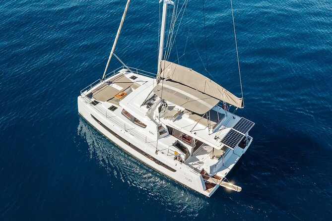Hersonissos: Luxury Sunset Catamaran Cruise Sushi & Open Bar - Setting sail from Hersonissos toward Saint George Bay
