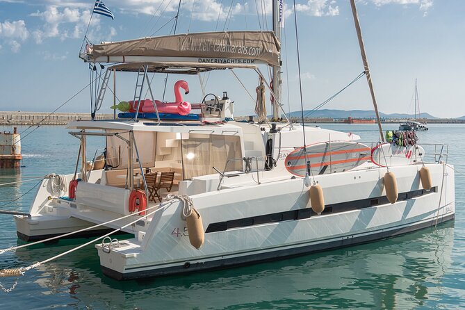 Hersonissos: Luxury Sunset Catamaran Cruise Sushi & Open Bar - Swimming, snorkeling, and paddleboarding from the catamaran