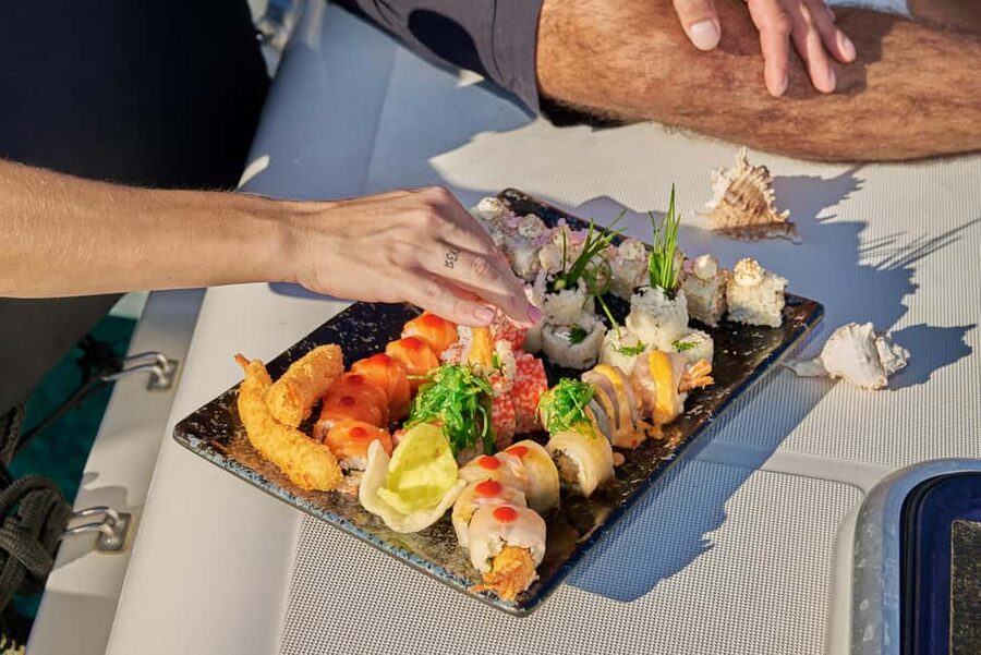 Hersonissos: Sunset Catamaran Cruise with Snacks and Drinks - Setting sail from Hersonissos Port