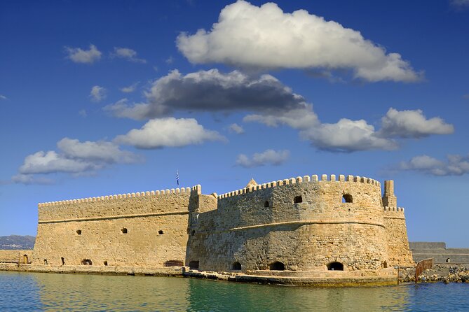 Hop-On Hop-Off Sightseeing Bus Tour in Heraklion - Stops 6 through 8: walls, a grave, and a city gate