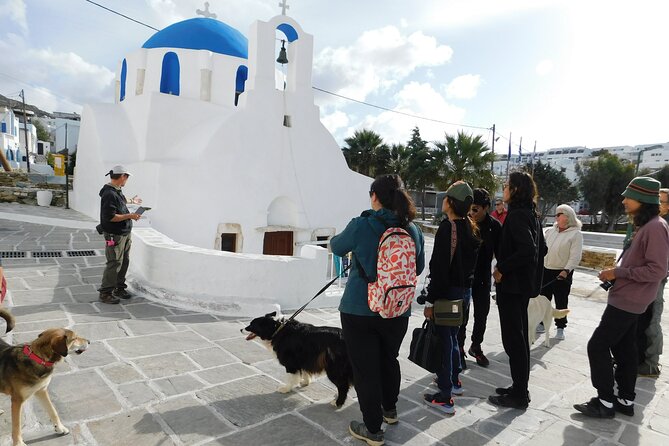 Ios Island Trekking Tours: Discover Ios Unexplored - Churches, paths, and the view toward the lighthouse