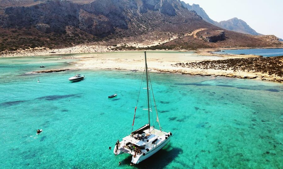 Kissamos: Balos & Gramvousa Luxury Catamaran Sailing Cruise - Leaving Kissamos with breakfast on board
