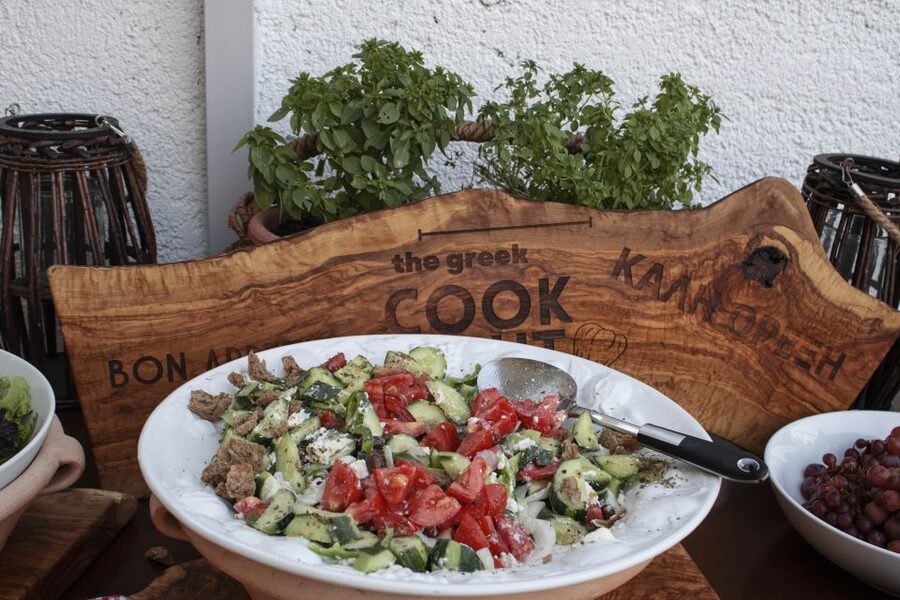 Kissamos: Greek Night with Buffet Dinner and Plate Smashing - Plate smashing with a practical dose of caution