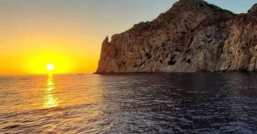 Kos: Sunset Cruise with Swimming and BBQ Dinner - Swimming at a stony southern beach