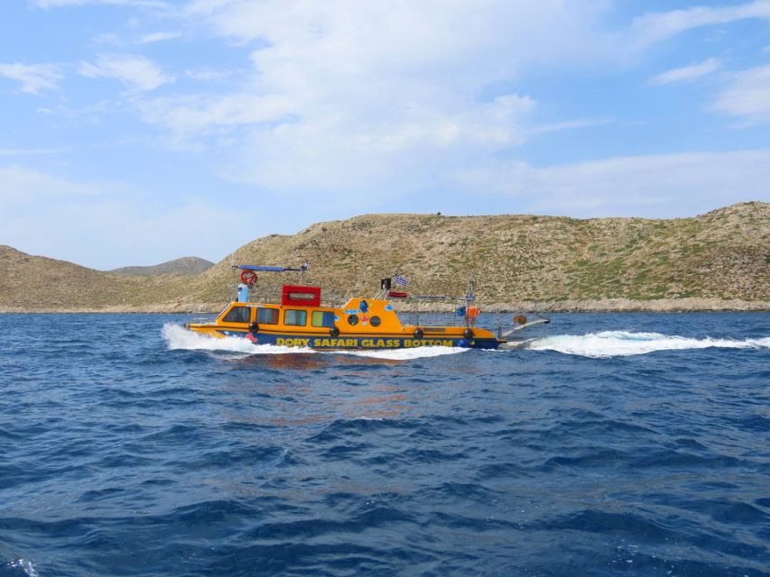 Kos Town: Glass-Bottom Boat Cruise with Swimming Stops - Finding the yellow Dorry in Kos Town