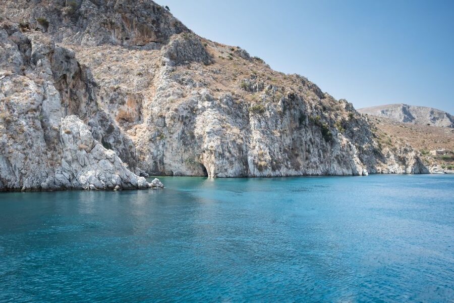 Kos Town: Kalymnos & Pserimos Day Cruise & Optional Transfer - Dolphins, music, and the Poseidon crew
