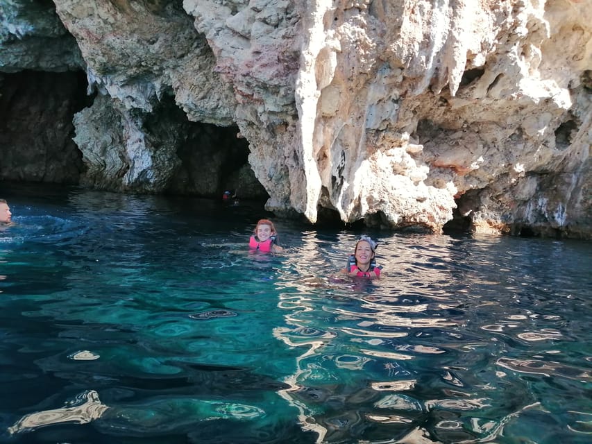 Lefkada: Blue Cave Kayak Tour with a Taste of Greece - Paddling beneath the cliffs of Rouda Bay