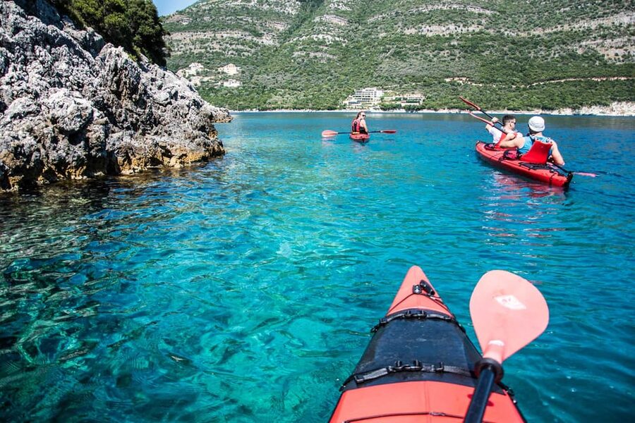 Lefkada: Blue Cave Kayak Tour with a Taste of Greece - Snorkeling over fish and red starfish