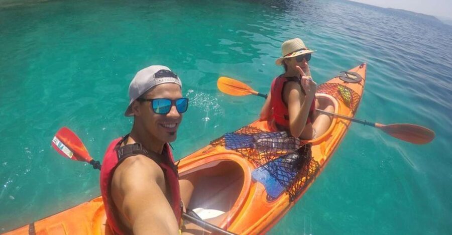 Lefkada: Hidden Blue Cave Kayak Trip with Lunch & Fruits - Entering the Blue Cave