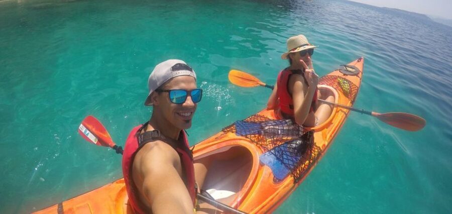 Lefkada: Hidden Blue Cave Kayak Trip with Lunch & Fruits - Snorkeling above the red starfish