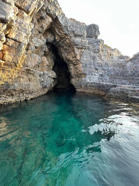 Lindos,Pefkos: All inclusive Swim & Snorkel Boat Cruise - Navarone Bay and its sweeping cliffs