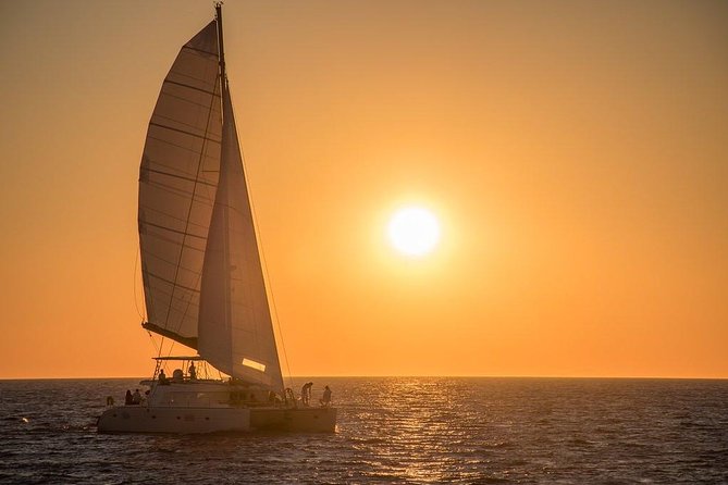 Luxury Small-Group Catamaran Cruise with BBQ, Open bar & Transfer - Mesa Pigadia, snorkeling, and the onboard meal