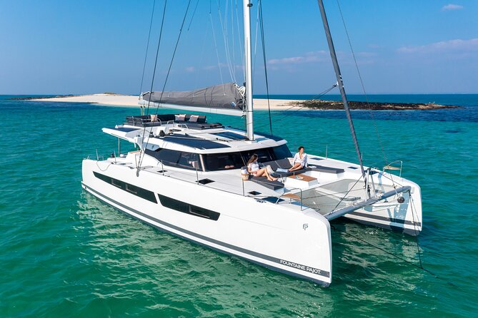 Mykonos: Brand-New Catamaran Cruise with Meal, Drinks & Transport - Rhenia: the main reason to bring your swimsuit