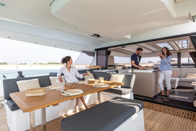 Mykonos: Brand-New Catamaran Cruise with Meal, Drinks & Transport - A possible view of Delos, not an archaeological tour