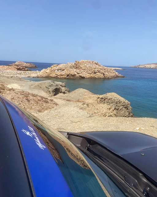 Mykonos: Private Island Tour with local guide -Jeep Renegade - Greek coffee, sweets, and local conversation