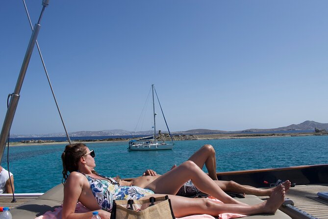 Mykonos Sail Cruise to Rhenia, Guided Tour of Delos, Lunch&Drinks - Lunch, wine, and a shared table