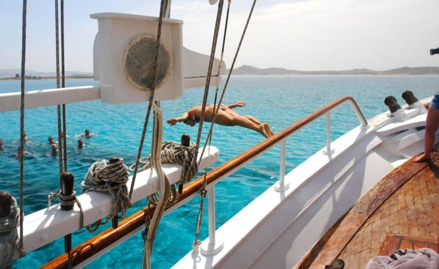 Mykonos: Sunset Party Boat Cruise with 1 Drink - Cruising north along the Mykonos coast
