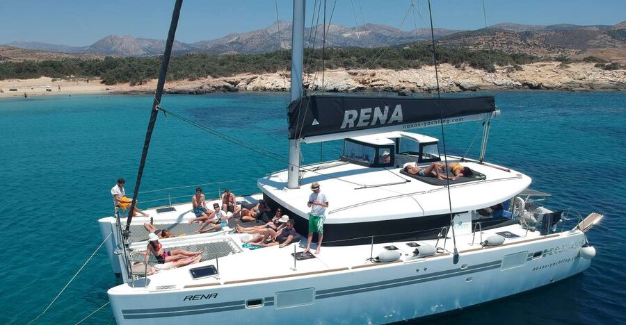 Naxos: Catamaran Cruise with Swim Stops, Food, and Drinks - Lunch with wine, fruit, and Greek flavors