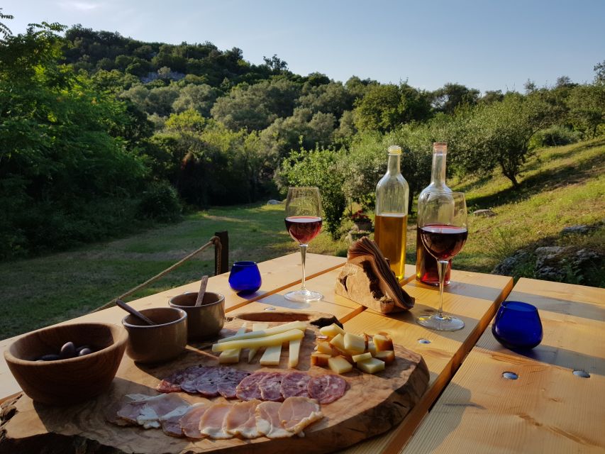 North Corfu: Olive Tour with Olive Oil Tasting and Mezze - Inside the early-1900s olive press