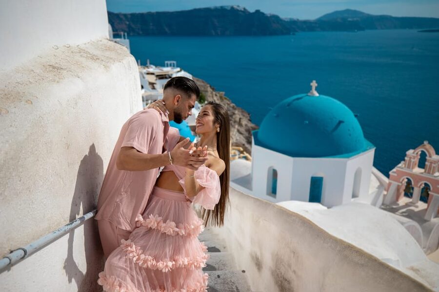 Oia: Couple photoshoot with 30 edited Photos - Moving through the blue-domed viewpoints