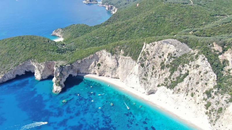 Paleokastritsa: Paradise, Yali Beach, & Blue Caves Boat Tour - Leaving Alipa Port with Andreas
