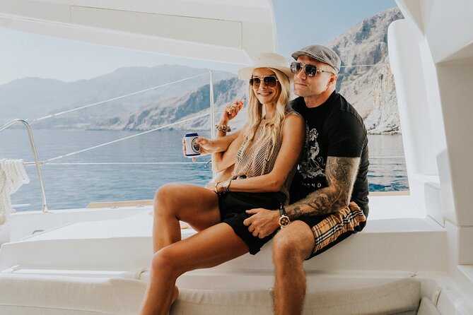 Panormo: Luxury Catamaran Cruise with Lunch & Open Bar - Cruising the rugged coast from Panormo
