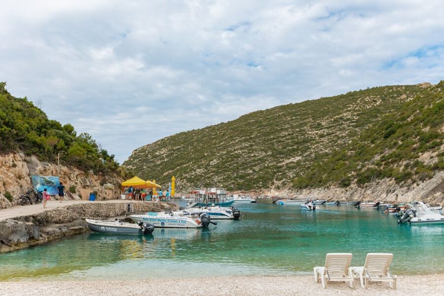 Porto Vromi: Navagio Shipwreck Beach & Blue Caves by Boat - The Blue Caves from a small boat