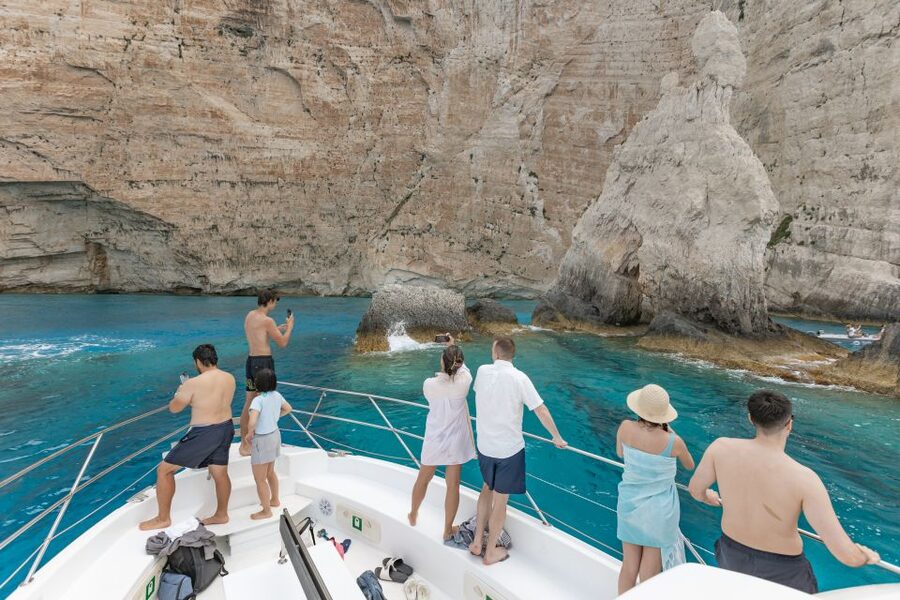 Porto Vromi: Navagio Shipwreck Beach & Blue Caves by Boat - Poseidon’s Profile and the details captains add