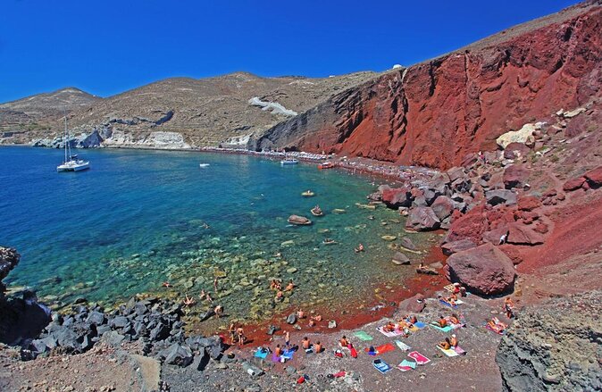 Private Customized Santorini Land Tour with a Local Driver - Red Beach shows Santorini’s volcanic side
