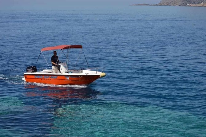 RENT A BOAT 5,5m - 30hp LICENSE FREE Chora Sfakion, Sfakia - Taking the Helm at Sfakia Port