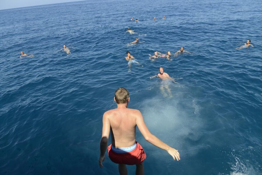 Rethymno: Pirate Boat Cruise with Swimming Stops - Greek salad after an hour in the water