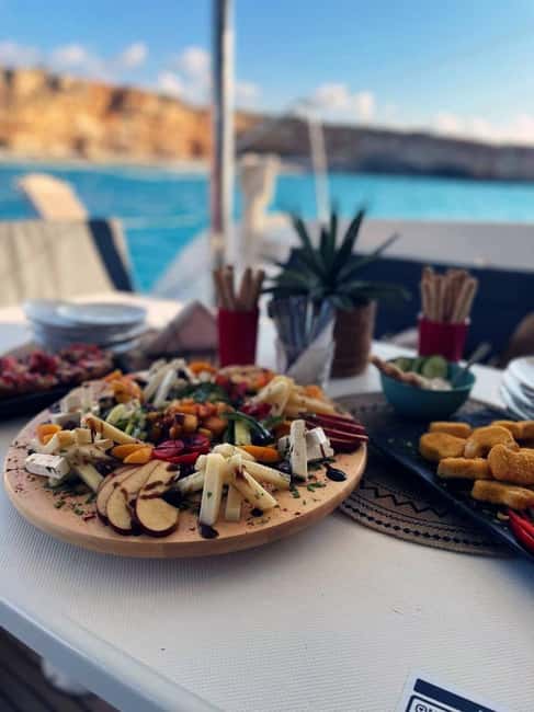 Rethymno: Sailing Catamaran Cruise with Meal & Drinks - Sun, shade, seasickness, and other practical matters