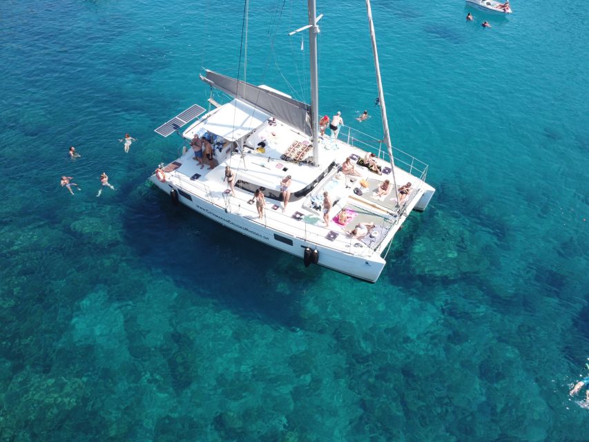 Rhodes: All-Inclusive Catamaran Cruise with Lunch and Drinks - A Mediterranean buffet served at sea