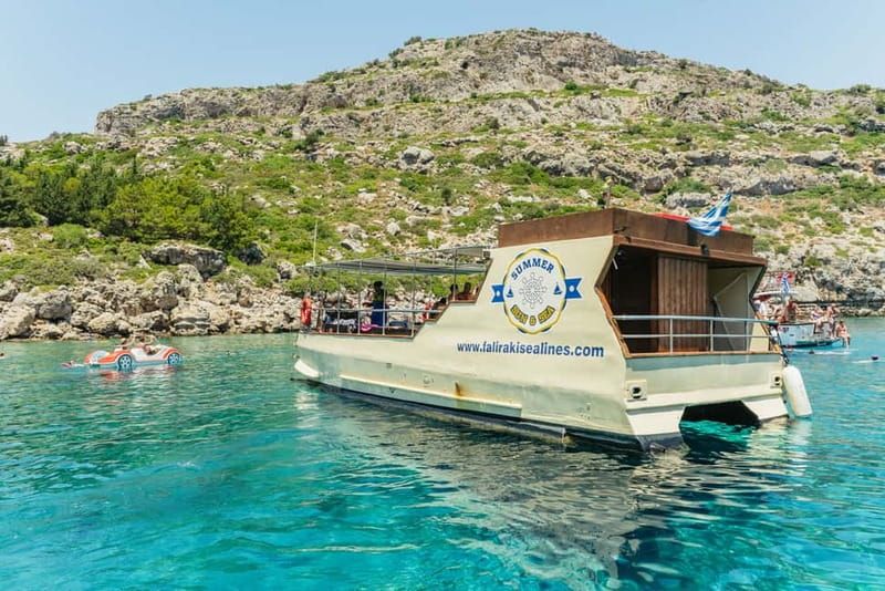 Rhodes: Anthony Quinn, Ladiko and Caves All-Inclusive Cruise - Traganou Caves, where the boat becomes part of the adventure