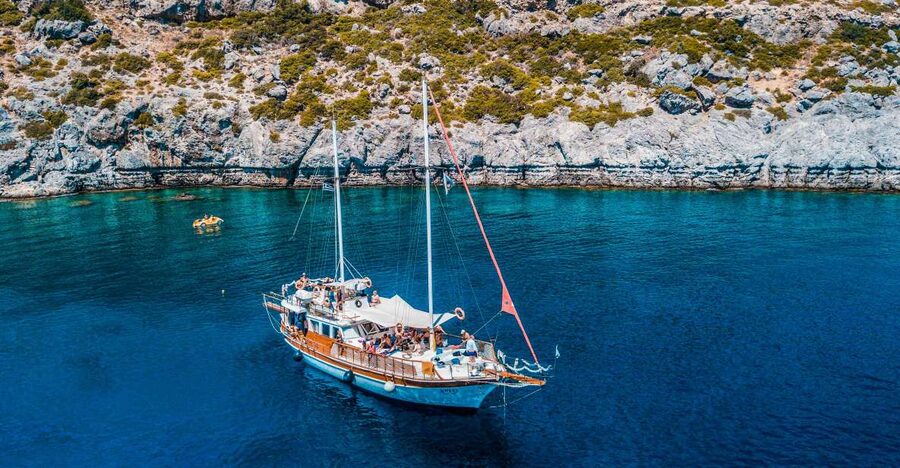 Rhodes: Cruise with 3 Stops, Lunch and Unlimited Drinks - Anthony Quinn Bay: emerald water and a dramatic first stop