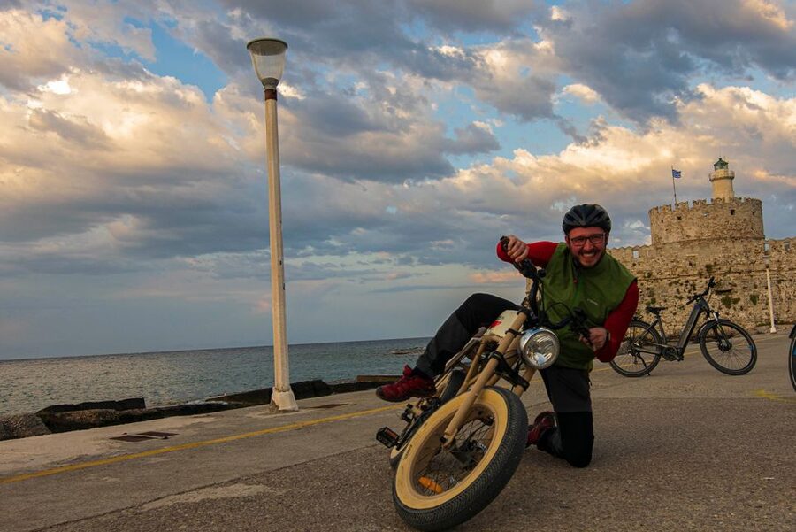 Rhodes: E-bike Highlights Sunset or Morning Photo Tour - Following the walls through gates and the moat