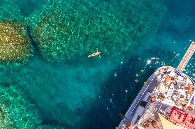 Rhodes Exclusive Swim Cruise Cocktail Open bar & Gourmet Buffet - What the boat setup means for your day