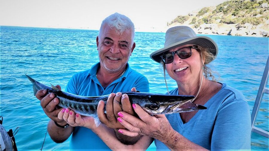 Rhodes: Fishing Trip, Snorkelling, BBQ, & Professional Guide - Lunch on the handmade barbecue