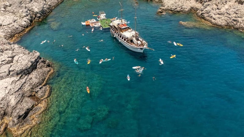 Rhodes: Gulet Trip with Food, Drinks, SUP, Kayak & Swimming - Greek lunch, wine, and what to expect on the plate